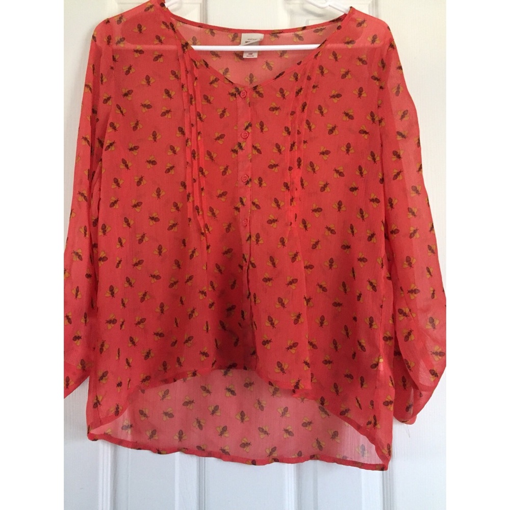 Coral blouse with bees